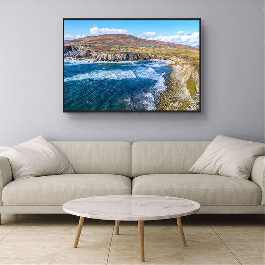 Achill Island framed print displayed above a cream leather sofa in a bright living room
