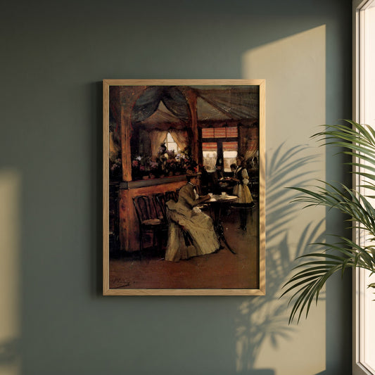 A Cup of Chocolate framed print in a natural oak frame on a dark green wall beside a window, dappled plant shadow