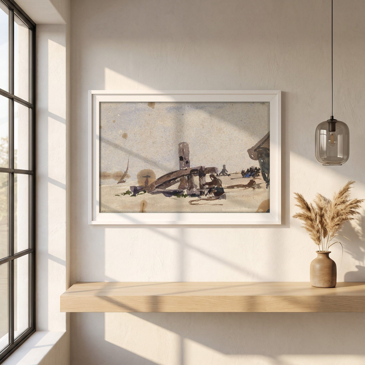 A Kneeling Man on the Beach framed print in a white frame on a plaster wall above an oak worktop in a bright Scandinavian kitchen