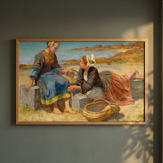 Breton Girls On a Beach By Irish Artist Aloysius O'Kelly framed print in a natural oak frame on a dark green wall beside a window, dappled plant shadow
