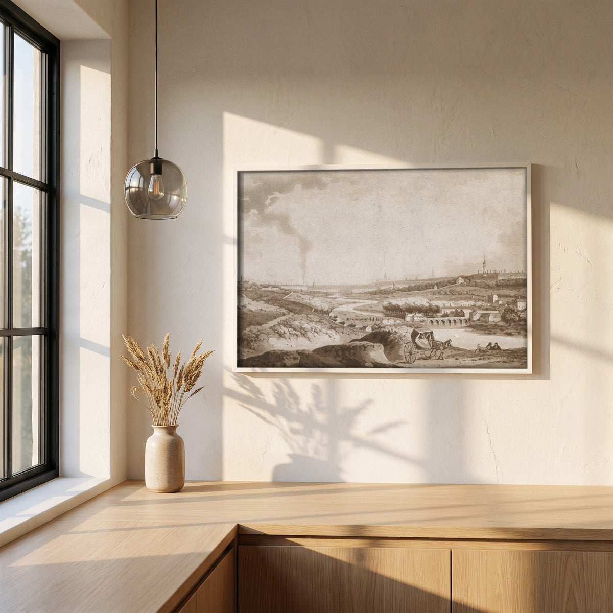 Dublin and Islandbridge from the Magazine Hill (1792) framed print in a white frame on a plaster wall above an oak worktop in a bright Scandinavian kitchen