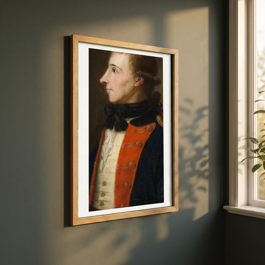 Theobald Wolfe Tone framed print in a natural oak frame on a dark green wall beside a window, dappled plant shadow
