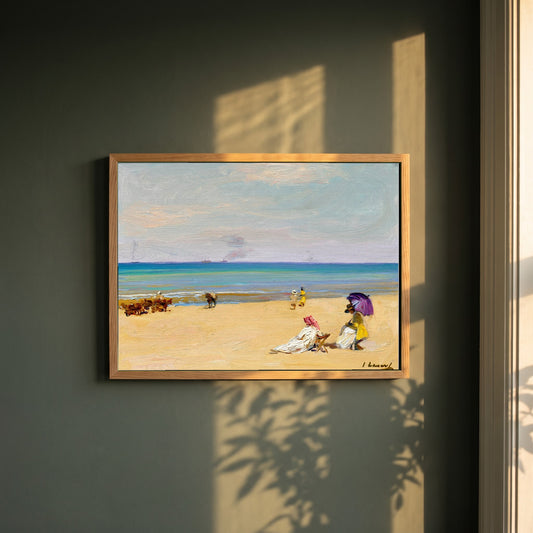 On The Sands framed print in a natural oak frame on a dark green wall beside a window, dappled plant shadow