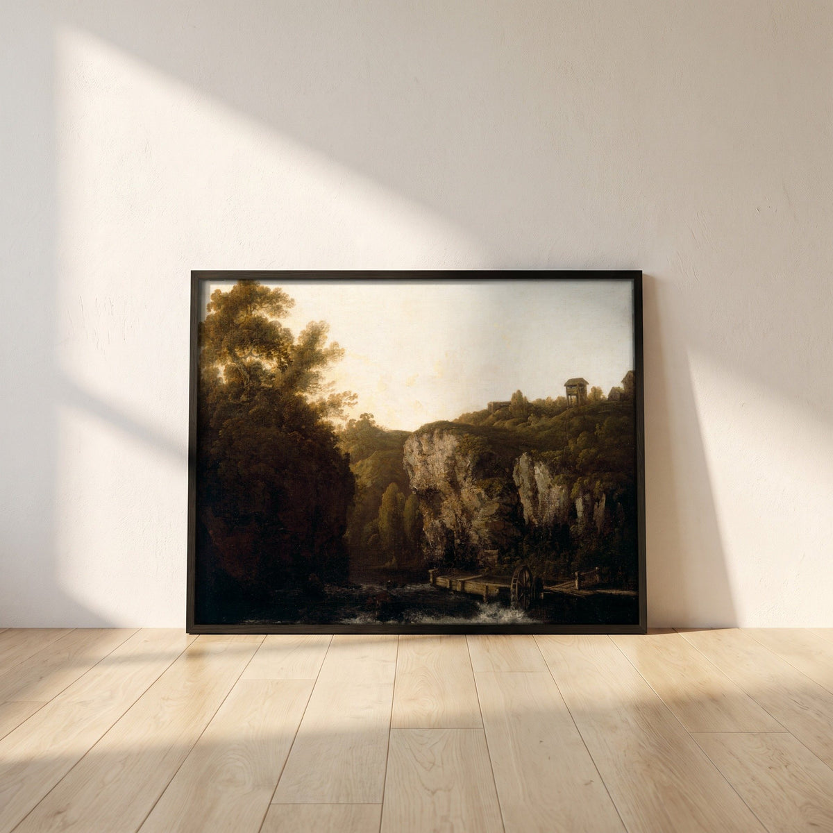 A View near Avoca framed print in a black frame leaning against a white plaster wall on oak floorboards in morning light