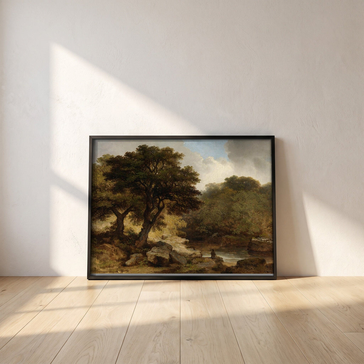 Glen of the Dargle by James Arthur O'Connor framed print in a black frame leaning against a white plaster wall on oak floorboards in morning light