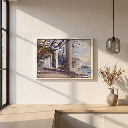 A Vine Pergola on Amalfi, Italy framed print in a white frame on a plaster wall above an oak worktop in a bright Scandinavian kitchen