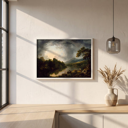 An Extensive Wooded River Landscape with Fishermen framed print in a white frame on a plaster wall above an oak worktop in a bright Scandinavian kitchen