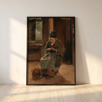 An Interior of a Breton Cottage framed print in a black frame leaning against a white plaster wall on oak floorboards in morning light