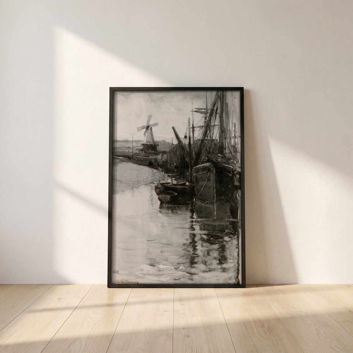 Boats in Rye Harbour, Sussex framed print in a black frame leaning against a white plaster wall on oak floorboards in morning light