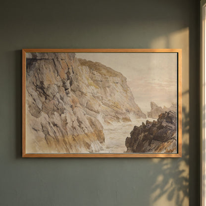 Cliffs at Howth, Dublin framed print in a natural oak frame on a dark green wall beside a window, dappled plant shadow