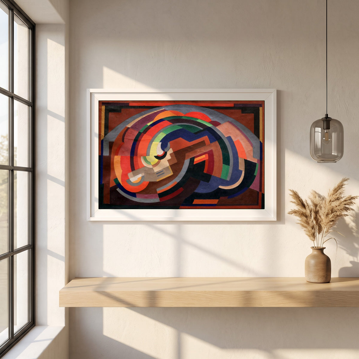 A Composition framed print in a white frame on a plaster wall above an oak worktop in a bright Scandinavian kitchen