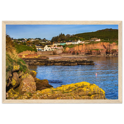 Dunmore East photographic landscape print in a natural wood frame