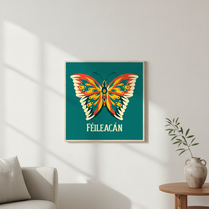 Féileacán butterfly print in an oak frame on a white wall above an armchair and side table