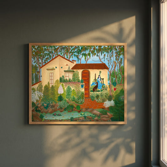 Irish Cottage Print | Josephine Joy | framed print in a natural oak frame on a dark green wall beside a window, dappled plant shadow