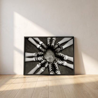 Irish Dancing Shoes Black & White framed print in a black frame leaning against a white plaster wall on oak floorboards in morning light