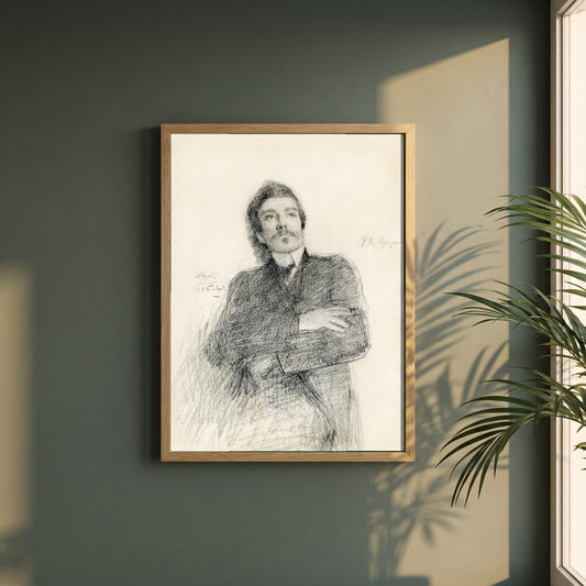 John Millington Synge framed print in a natural oak frame on a dark green wall beside a window, dappled plant shadow