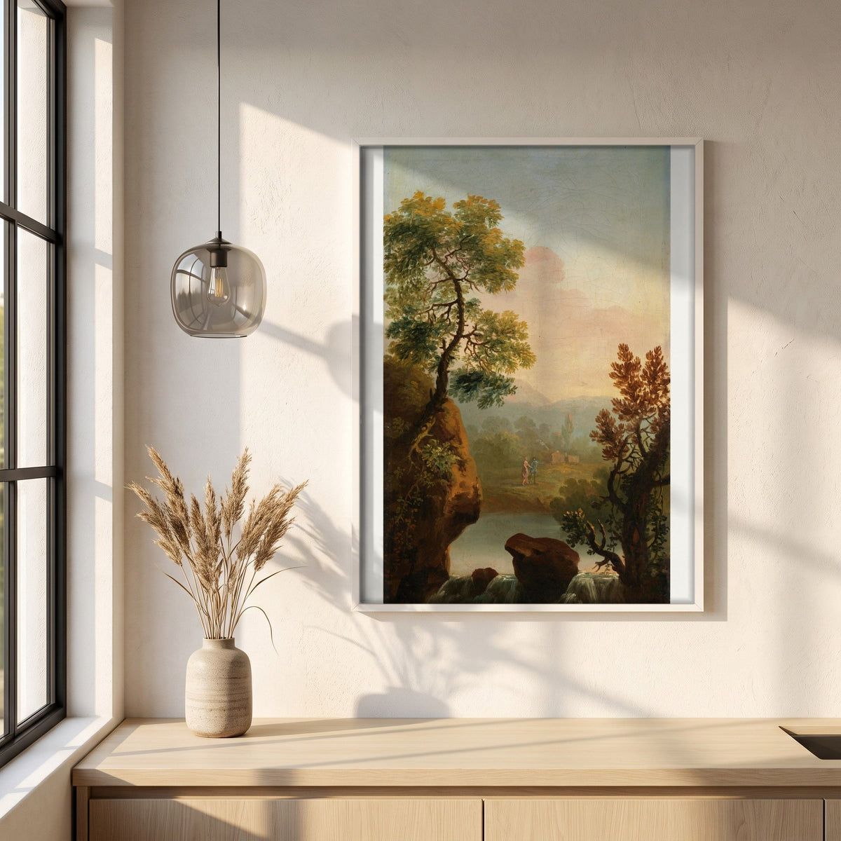 Landscape with Figures in the Background framed print in a white frame on a plaster wall above an oak worktop in a bright Scandinavian kitchen