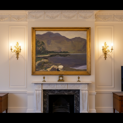 Loch Katrine by Sir John Lavery in a gilt frame above a white marble fireplace between wall sconces