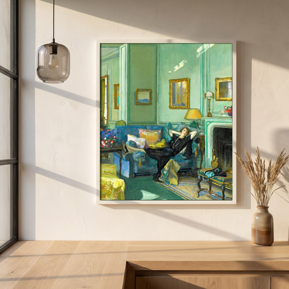 Mrs. Osler framed print in a white frame on a plaster wall above an oak worktop in a bright Scandinavian kitchen