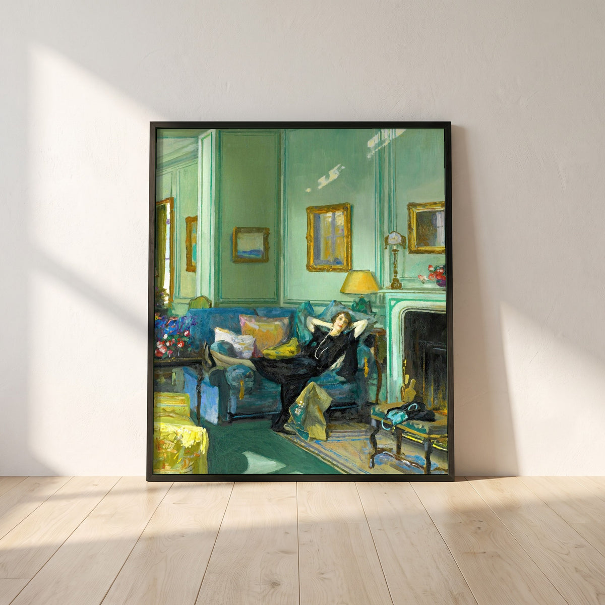 Mrs. Osler framed print in a black frame leaning against a white plaster wall on oak floorboards in morning light