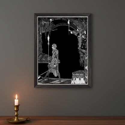 Myself No Power by Harry Clarke framed print on a grey wall above a lit candle