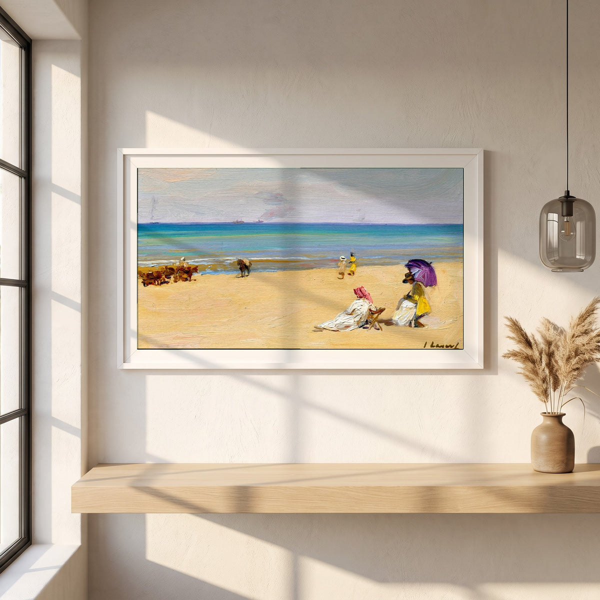 On The Sands framed print in a white frame on a plaster wall above an oak worktop in a bright Scandinavian kitchen