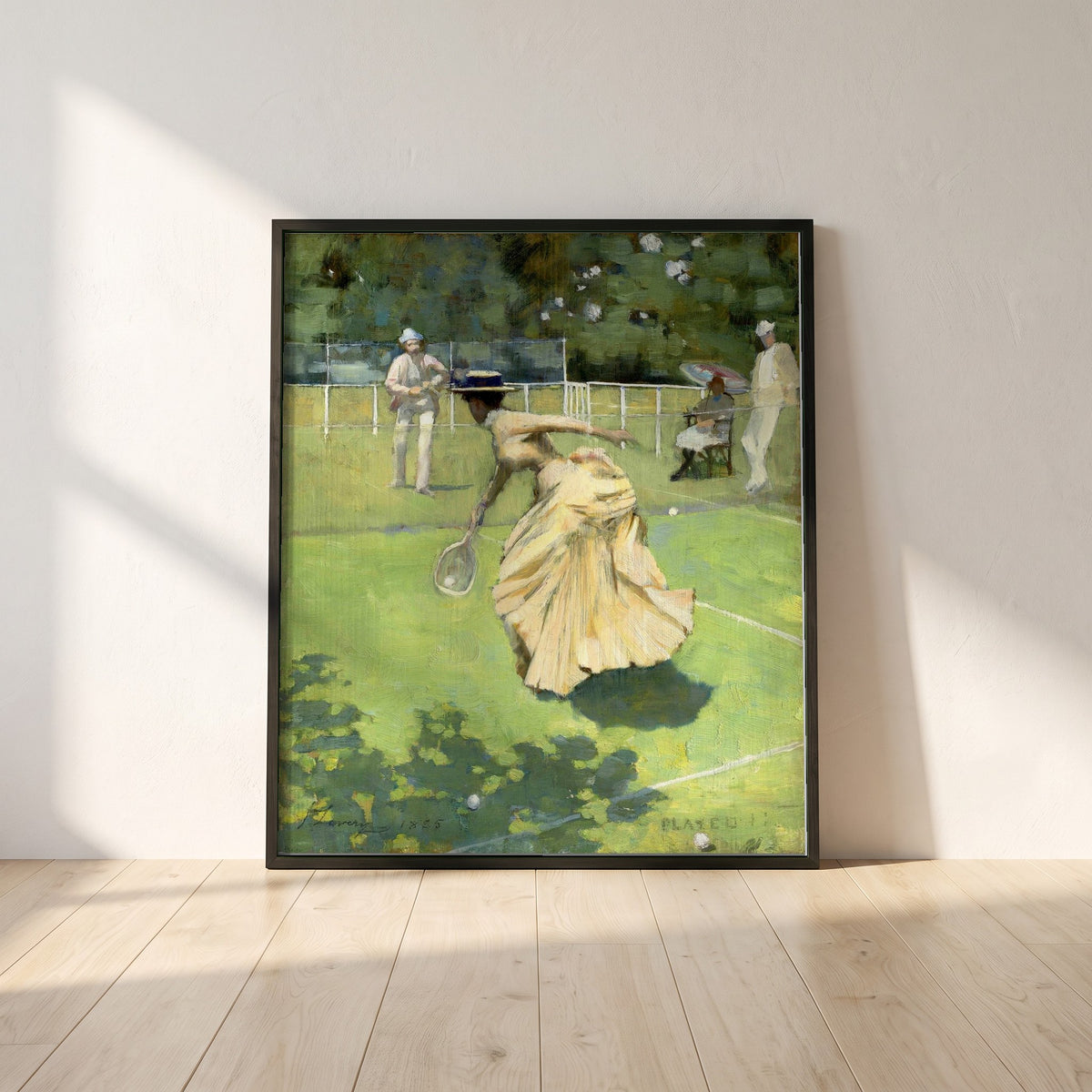 Sir John Lavery framed print in a black frame leaning against a white plaster wall on oak floorboards in morning light