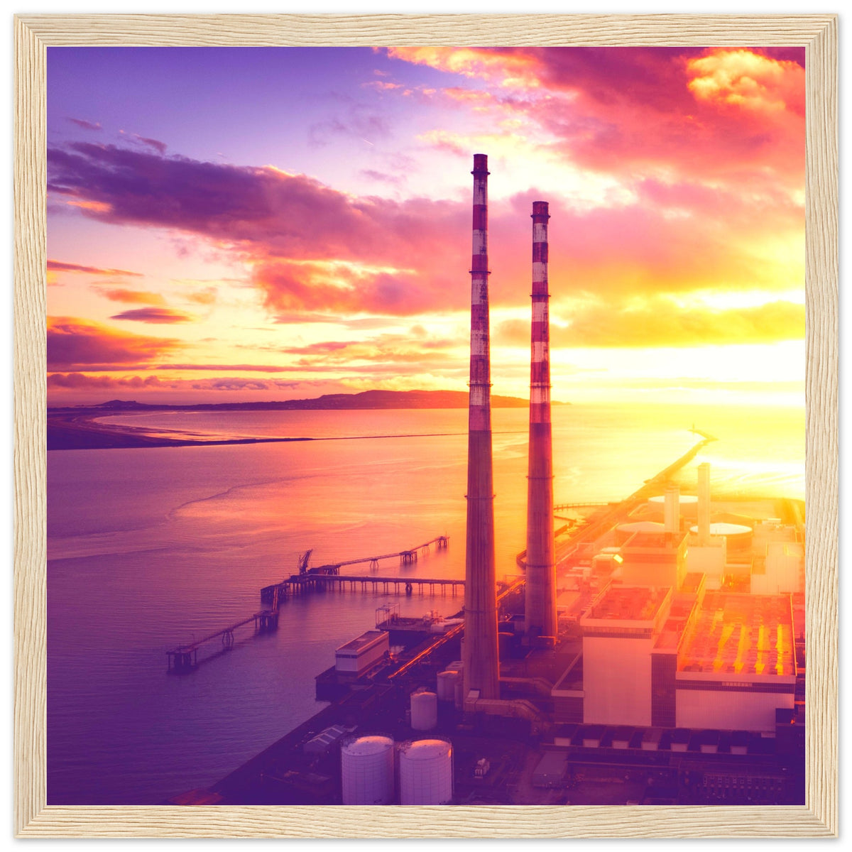 Poolbeg Towers aerial photo print in a natural wood frame