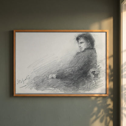 Portrait of a Young W.B. Yeats framed print in a natural oak frame on a dark green wall beside a window, dappled plant shadow