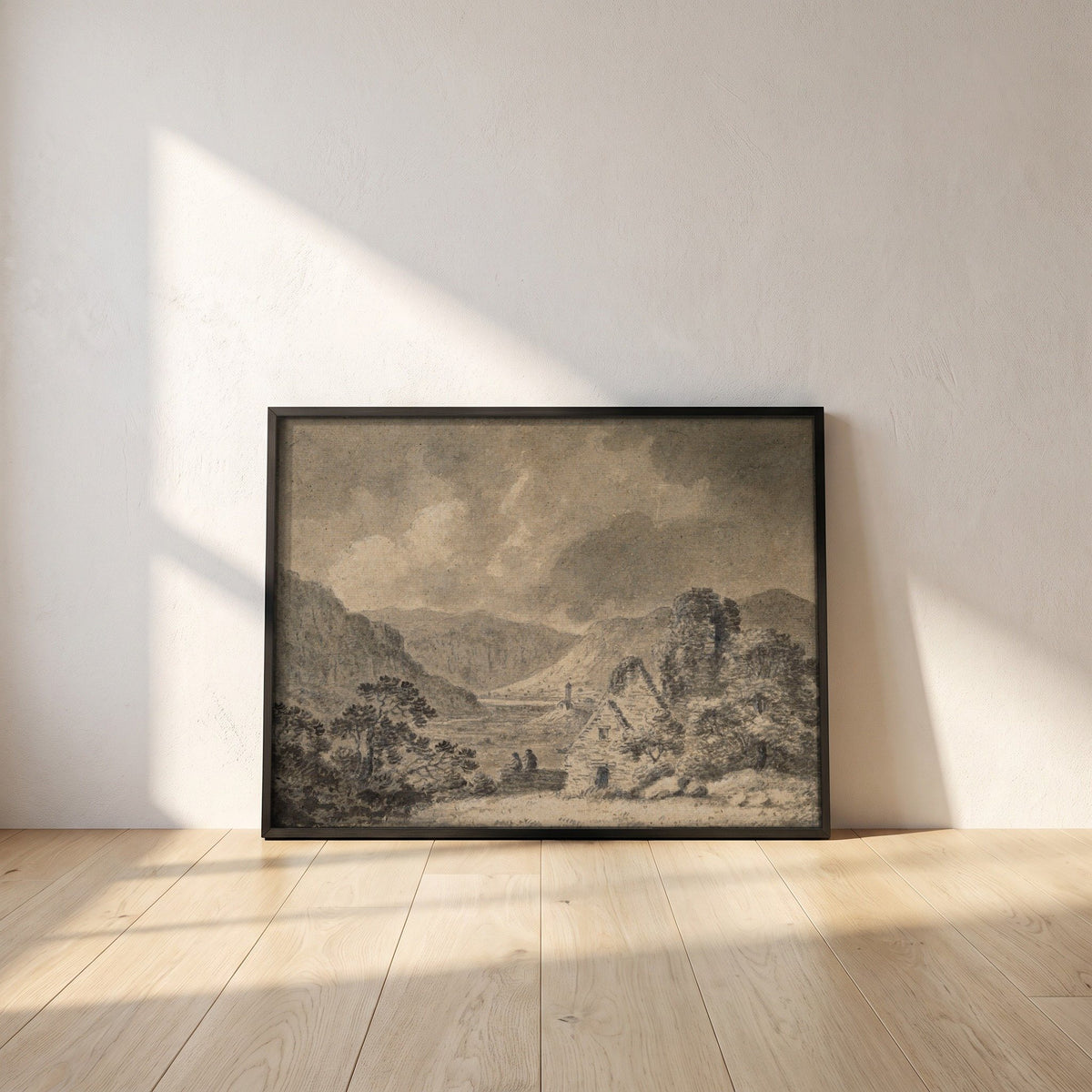 Saint Saviour's, Saint Kevin's and the Lower Lake, Glendalough framed print in a black frame leaning against a white plaster wall on oak floorboards in morning light