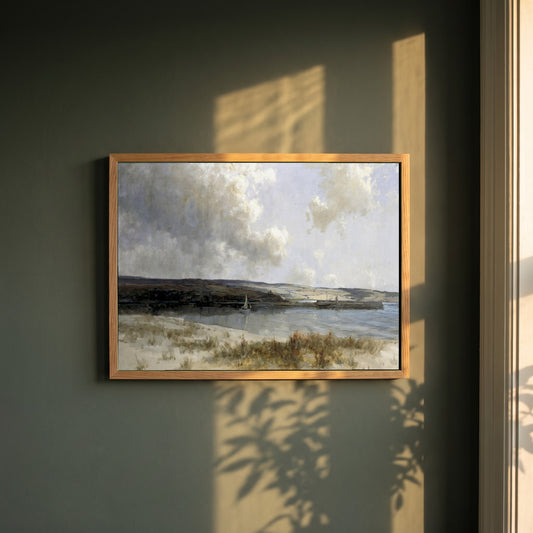 The End of the Glen framed print in a natural oak frame on a dark green wall beside a window, dappled plant shadow