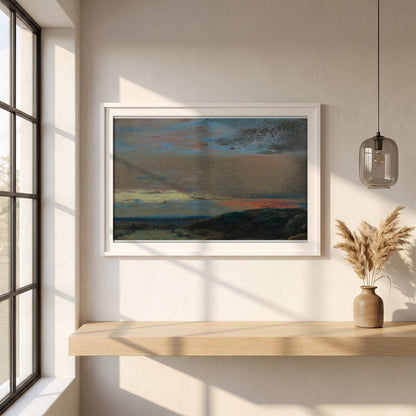 The Moor at Sunrise framed print in a white frame on a plaster wall above an oak worktop in a bright Scandinavian kitchen