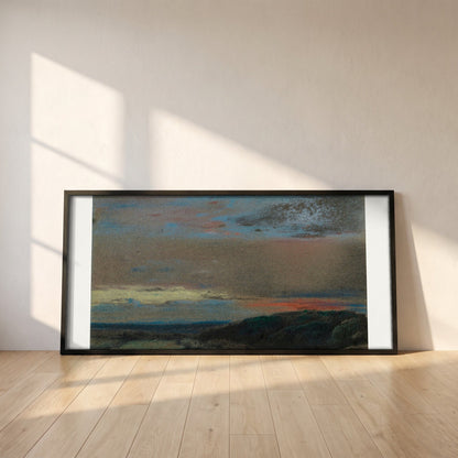 The Moor at Sunrise framed print in a black frame leaning against a white plaster wall on oak floorboards in morning light