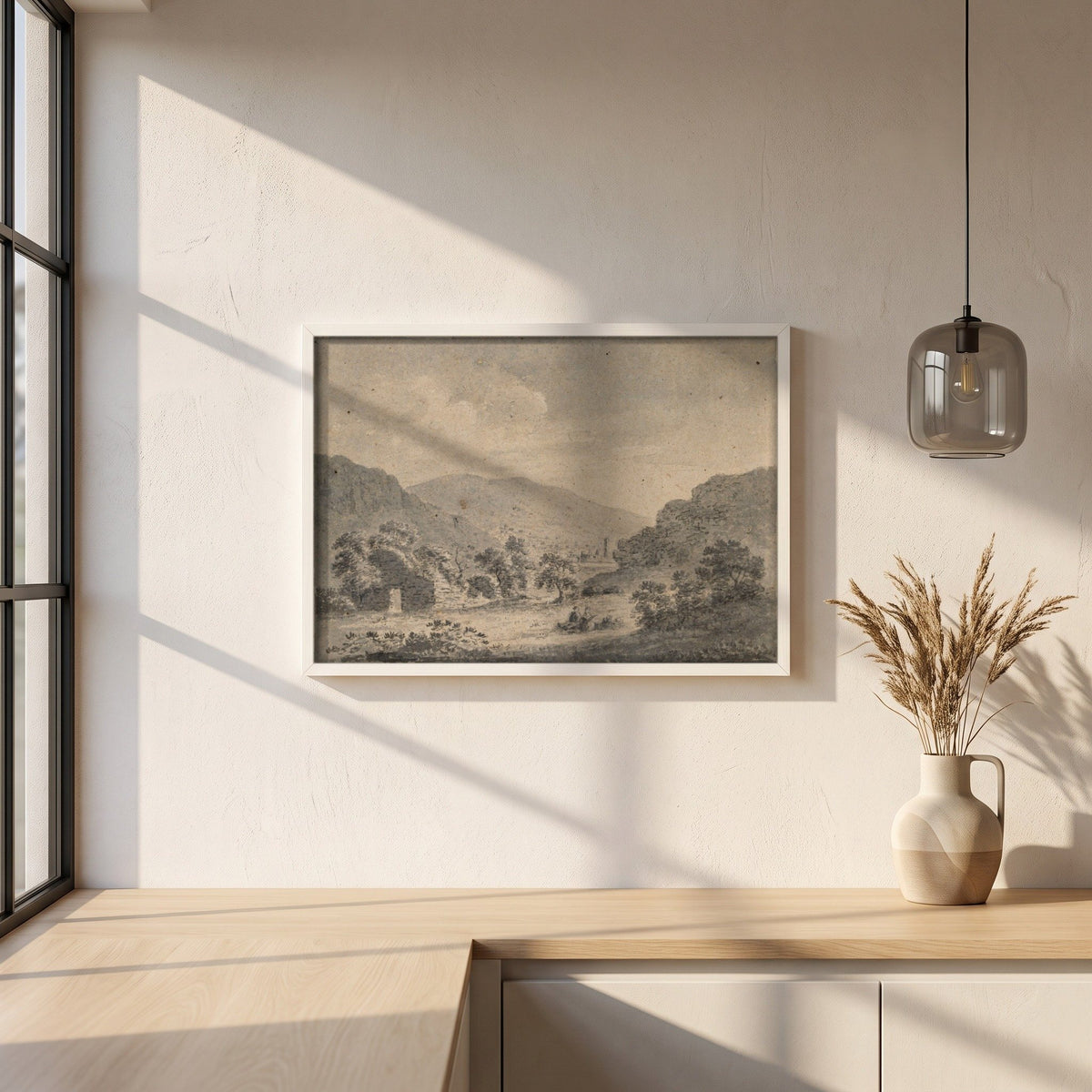 The Round Tower, Glendalough, from Temple-na-Skellig framed print in a white frame on a plaster wall above an oak worktop in a bright Scandinavian kitchen