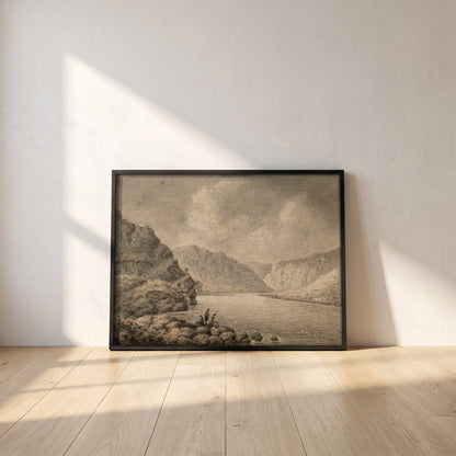 The Upper Lake, Glendalough framed print in a black frame leaning against a white plaster wall on oak floorboards in morning light
