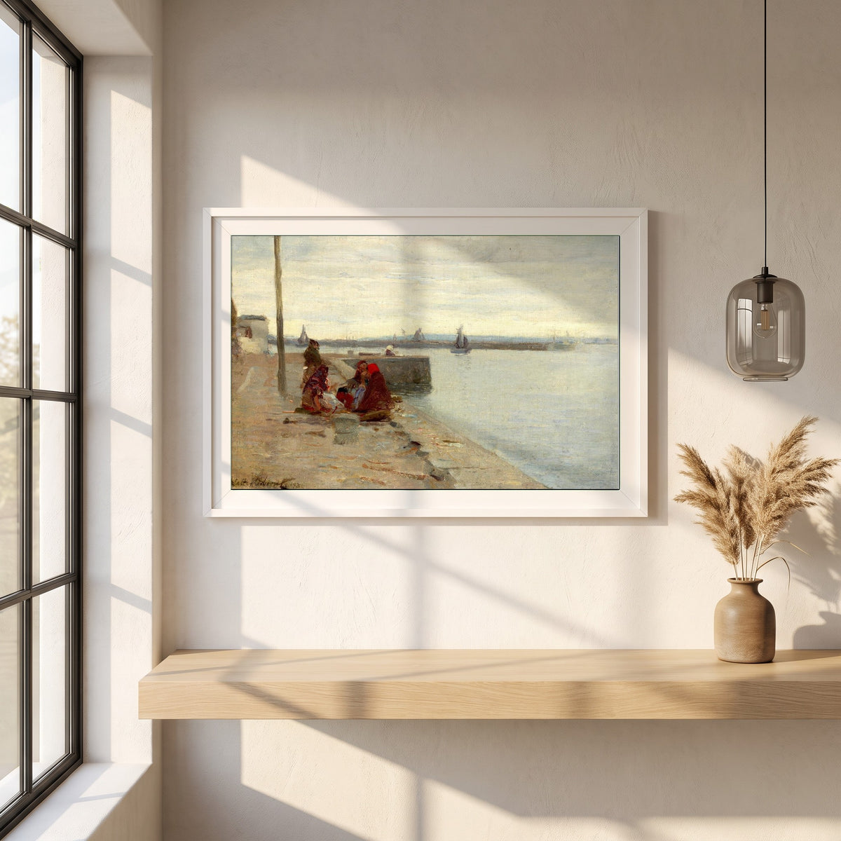 Women on a Galway Quayside framed print in a white frame on a plaster wall above an oak worktop in a bright Scandinavian kitchen